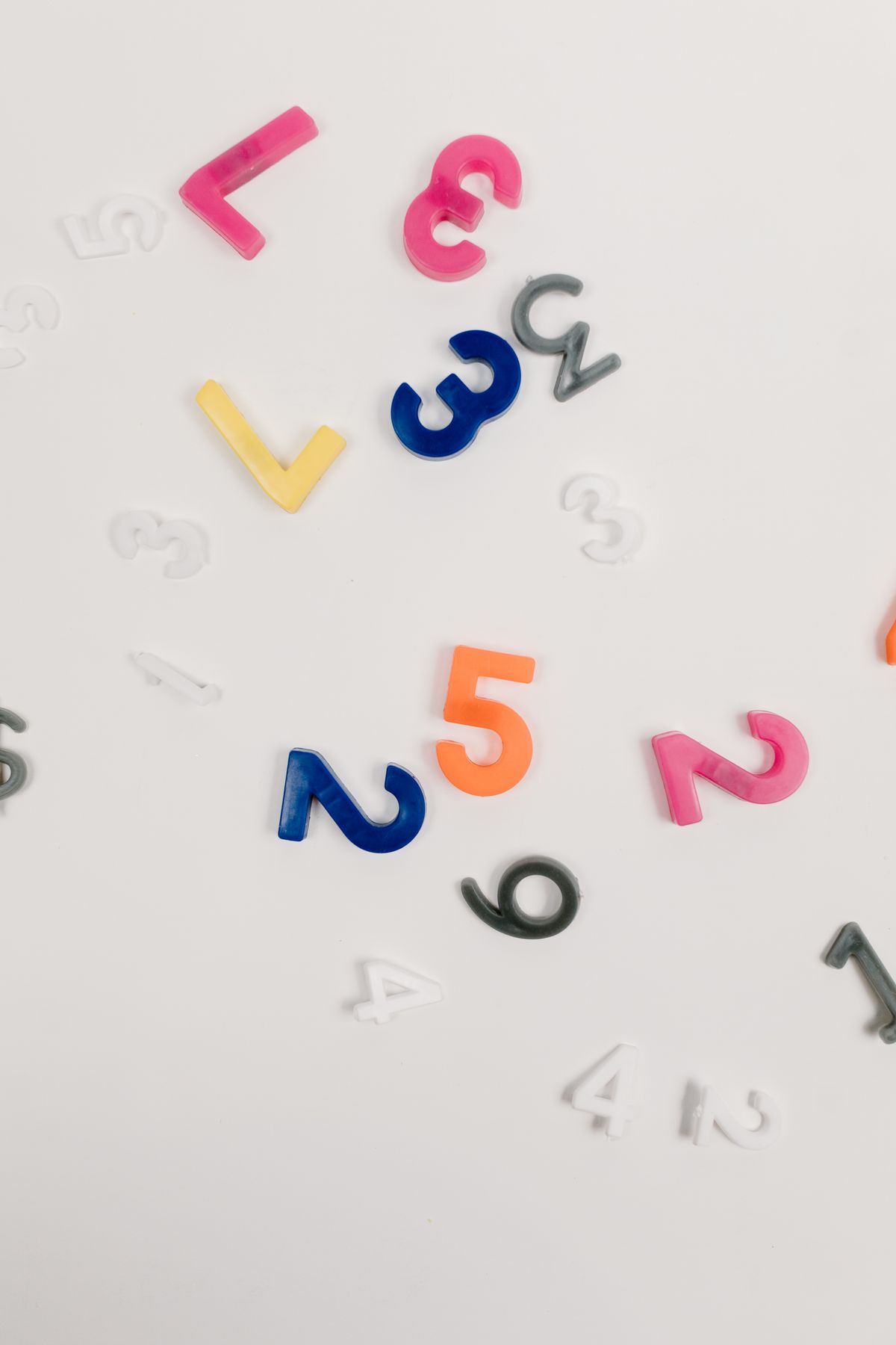 Colorful number tiles arranged on a light surface